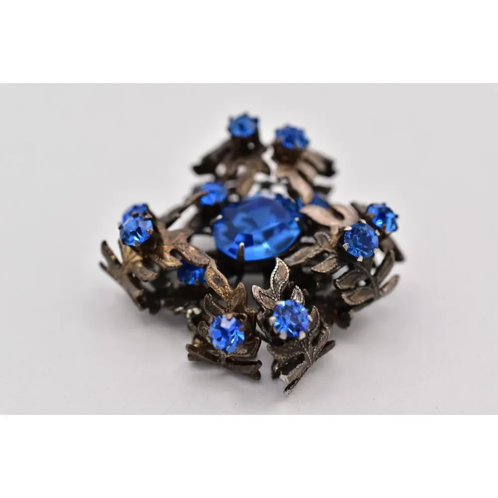 Vintage Austrian Blue Crystal Pin Brooch 3D Flower Gunmetal Tone 1960s BinBI